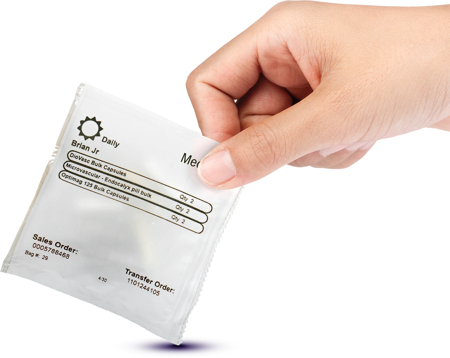 A hand holding a MedPax packet